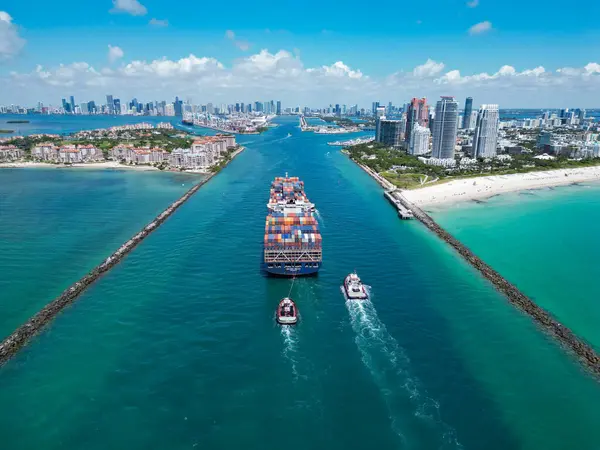 stock image Miami, Florida, USA - June 06, 2024: Cargo ship barge in Miami Biscayne bay. Miami marina bay view. Cargo ship in Florida. Miami beach with barge in Biscayne bay.