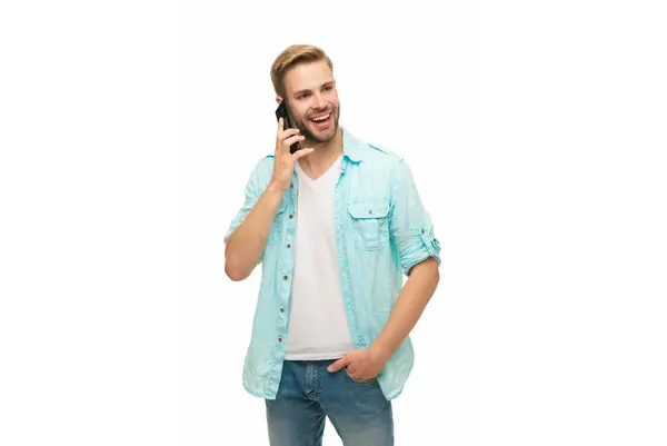 stock image Man talk on smartphone. Phone call. Mobile communication. Communication. Man speak on smartphone isolated on white. Millennial man has phone conversation. Voice contact. Business call.