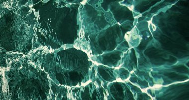 Bahamalar 'da dalgalı havuz suyunun turkuaz renk arkaplanı.