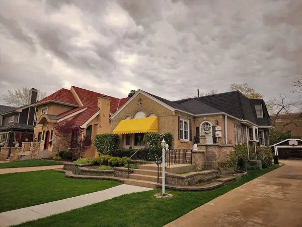 stock image modern cottage house. architecture concept. property in neighborhood. residential building house outdoor. architectural design. residence architecture. suburban house architecture. nice street.