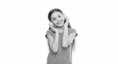 child elearning in headset. Modern technology has influenced the way our children play. the best headphones little girl listen to music. Protect Developing Ears. happy childhood.