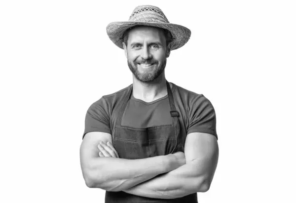 stock image happy caucasian man in hat and apron isolated on white background.