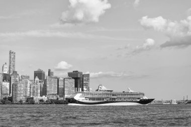 New York, USA - June 16, 2023: Cruise ship Marella Discovery Manhattan in New York. Skyline of New York Manhattan cruising on the Hudson River cruise liner TUI cruises clipart