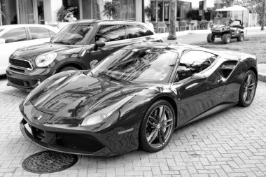 Miami Beach, Florida USA - April 18, 2021: red Ferrari 488 GTB sportcar, corner view.