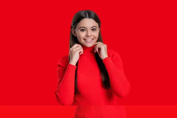 stock image Stylish teen girl has long hair in monochrome fashion style isolated on red.