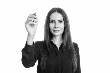 Görünmez okul yönetim kurulunda öğretmen yazıyor. Öğretmen yazmak için kalem tutuyor. Yazıyormuş gibi yapan kadın. Okulda öğretmenlik. Okula dönelim. 1 Eylül. Kaleme metin yaz, boşluğu kopyala.