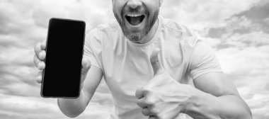 cropped view of guy presenting smartphone screen with copy space.