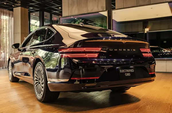 stock image New York City, USA - August 06, 2023: Genesis G80 black Hyundai electric car rear and driver side view parked at dealer exhibition hall