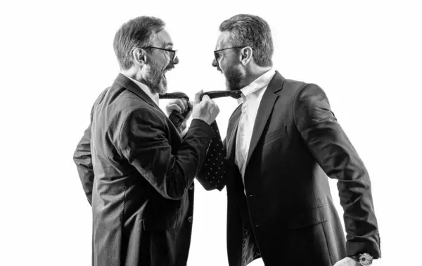 stock image businessmen arguing without subordinate in white studio. subordinate arguing businessmen. photo of businessmen arguing, subordinate. subordinate of two angry businessmen isolated on white.