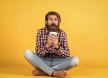 i like this. good morning to you. energetic warm beverage. need some coffee for inspiration. perfect start of the day. happy bearded man drinking morning coffee. man drink hot tea from cup. clipart