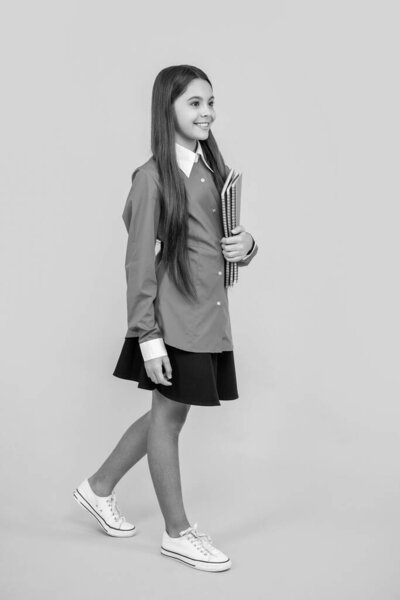 study at school lesson. back to school. knowledge and education. college student girl. teen girl gets high education. education in school. teen girl holding workbook. determined and focused.