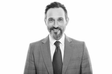 İşadamı beyazdan izole edilmiş. Takım elbiseli bir iş adamı. Olgun iş adamı. İş adamı portresi. Başarılı bir iş. Girişimcinin başarısı. Ofis yöneticisi portresi.