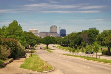 empty road with destination in horizon with cityscape. road way with power lines. travelling by road way. road way with no cars. clipart