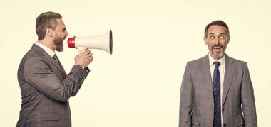 businessmen ignore shouting in megaphone, copy space. two businessmen ignore shouting in megaphone. businessmen ignore shouting in megaphone isolated on white. businessmen ignore shouting in megaphone clipart