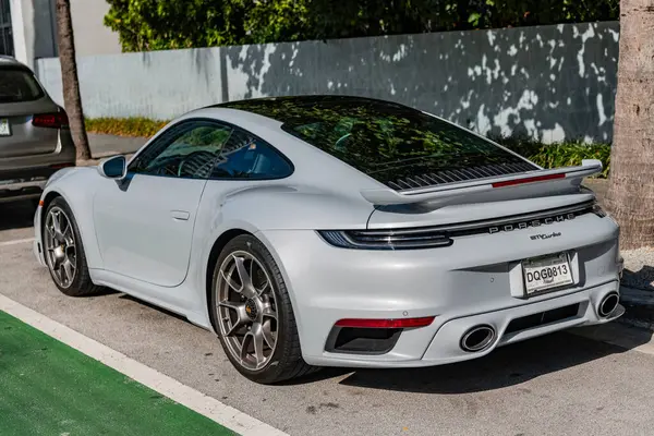 stock image Miami Beach, Florida USA - June 9, 2024: Porsche 911 Carrera turbo at miami beach. Grey orsche 911 Carrera turbo