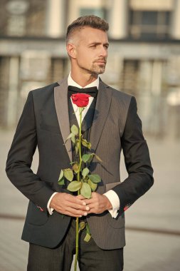 proposal concept. black tuxedo man prepare for proposal. man before romantic proposal.
