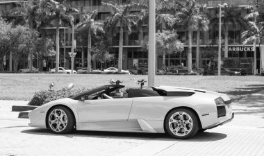 Miami Beach, Florida USA - April 15, 2021: yellow lamborghini diablo v12 6.2L, side view. convertible supercar.