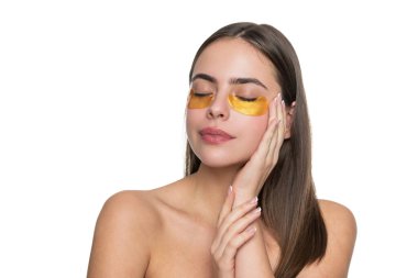 Sağlıklı cilt kozmetolojisi. Sorunlu cilt. Kadın göz bandı kullanıyor. Yüz maskesi. Kore güzellik kozmetik ürünleri. Vitamin kolajen bandı. Yamalı bir kadının güzellik kozmetolojisi. Doğal güzellik. Spa rahatla.