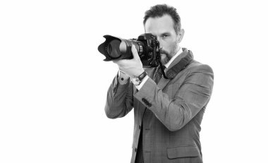 journalist man paparazzi photographer taking photo with camera isolated on white, copy space. clipart