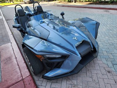 Miami Beach, Florida USA - June 6, 2024: 2023 Polaris Slingshot SL Grey. Polaris Slingshot at miami beach ocean drive florida clipart