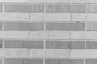 Tuğla ustalığı. Malzeme konsepti. Tuğla duvarın yüzeyi. Kalıplaşmış kahverengi fon. Duvar dokusu arka planı. Tuğla duvar yapısı. Tuğla cephesi.