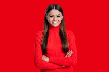 Teen monochrome fashion style. Style for girl. Headshot portrait of happy teen girl isolated on red. Teen girl looking at camera. Casual style. Stylish girl has long hair. Graceful posture. clipart