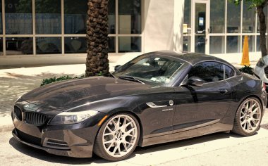 Miami Beach, Florida USA - April 15, 2021: 2010 BMW Z4 sDrive35i roadster car, side view.
