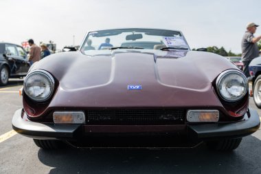 Chicago, Illinois, USA - September 08, 2024: TVR S series retro sportscar convertible vehicle, corner view. Retro sportscar. Convertible TVR S car. TVR 3000 S at Chicago Auto Show. clipart