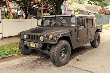 New York City, USA - August 26, 2023: Hummer H1 General Motors SUV off roader truck, corner view. clipart