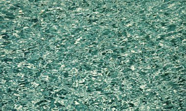 dalgalı mavi yüzme havuzu arka planı.