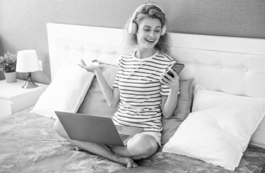 cheerful woman freelancer has remote work. remote working woman freelancer at home. freelancer woman on remote.