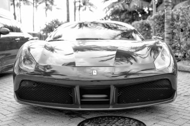 Miami Beach, Florida USA - April 18, 2021: red Ferrari 488 GTB, front view low angle.