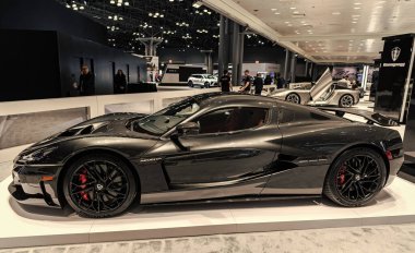 New York City, ABD - 27 Mart 2024: Rimac Nevera supercar electric car at New York International Auto Show, side view.