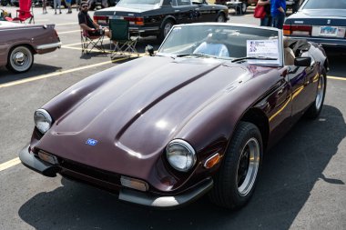 Chicago, Illinois, USA - September 08, 2024: TVR S series retro sportscar convertible vehicle, corner view. Retro sportscar. Convertible TVR S car. TVR 3000 S at Chicago Auto Show. clipart