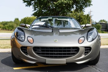 Chicago, Illinois, USA - September 08, 2024: 2005 Lotus Elise sportscar vehicle, front view. Grey metallic sportscar. Modern Lotus Elise car. Lotus Elise at Chicago clipart