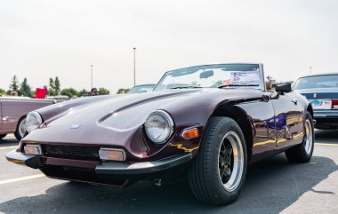 Chicago, Illinois, USA - September 08, 2024: TVR S series retro sportscar convertible vehicle, corner view. Retro sportscar. Convertible TVR S car. TVR 3000 S at Chicago Auto Show. clipart