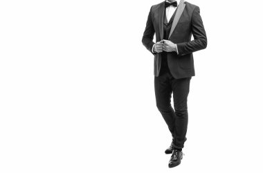 hoary elegant man waiter with bowtie isolated on white background. full length.