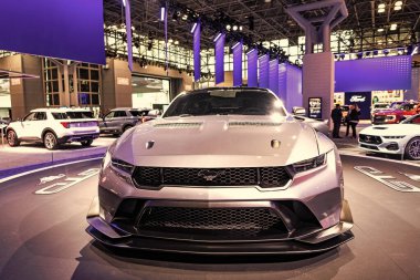 New York City, USA - March 27, 2024: Ford Mustang GTD sportscar car at New York International Auto Show, front view. clipart