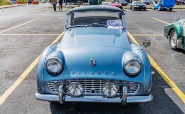 Chicago, Illinois, USA - September 08, 2024: Triumph tr3 retro car, front view. Retro car. Blue Retro triumph tr3 . Triumph tr3 at Chicago clipart