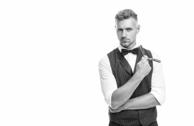 man barber with razor blade in bow tie isolated on white background with copy space.