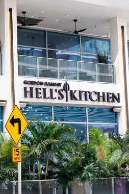 Miami, Florida, USA - December 01, 2024: Restaurant of Gordon Ramsay Hells Kitchen. Building with logo brand name of Hells kitchen. restaurant by Gordon Ramsay. Gordon Ramsay Hells Kitchen. clipart