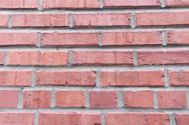 Duvar dokusu arka planı. Tuğla duvar yapısı. Tuğla ustalığı geçmişi. Malzeme konsepti. Tuğla duvarın yüzeyi. Kalıplaşmış kahverengi fon. Şehir tuğla ayarı.