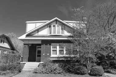 Mahalle sakinleri. Rahat bir mahalle. Banliyö ev mimarisi. Mimarlık konsepti. Mahalledeki bir mülk. Banliyö tasarımı. İkamet mimarisi. Amerika 'nın evi.