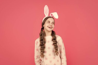 good friday. just having fun. ready for party. happy childhood. cheerful bunny kid. happy easter holiday. funny child in rabbit ears. smiling teenager girl in sleepwear. bunny hunt begin.