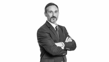 Takım elbiseli başarılı bir CEO. Kendine güvenen bir girişimci. İş liderliği. Profesyonel, olgun CEO başarısını ifade ediyor. İşadamı beyazdan izole edilmiş. İş başarısı. Hedef ayarı.