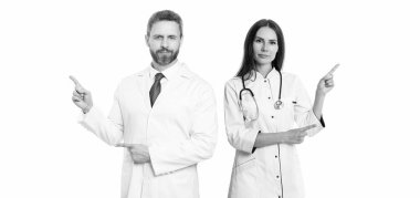 Hastanedeki doktor ve hemşire meslektaşları beyaz, işaret parmağıyla izole edilmiş sağlık hizmetleri ve sağlık hizmetleri sağlıyorlar..