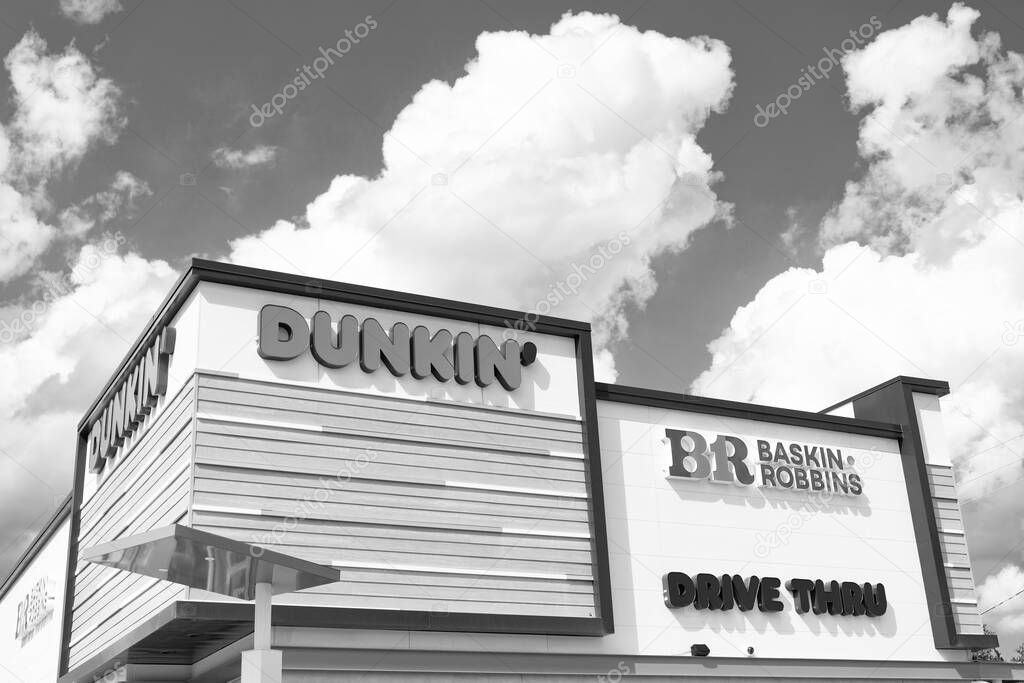 Chicago, USA - August 16, 2024: Combined Dunkin Donuts and Baskin Robbins cafe. Corner view. best ice cream and donuts