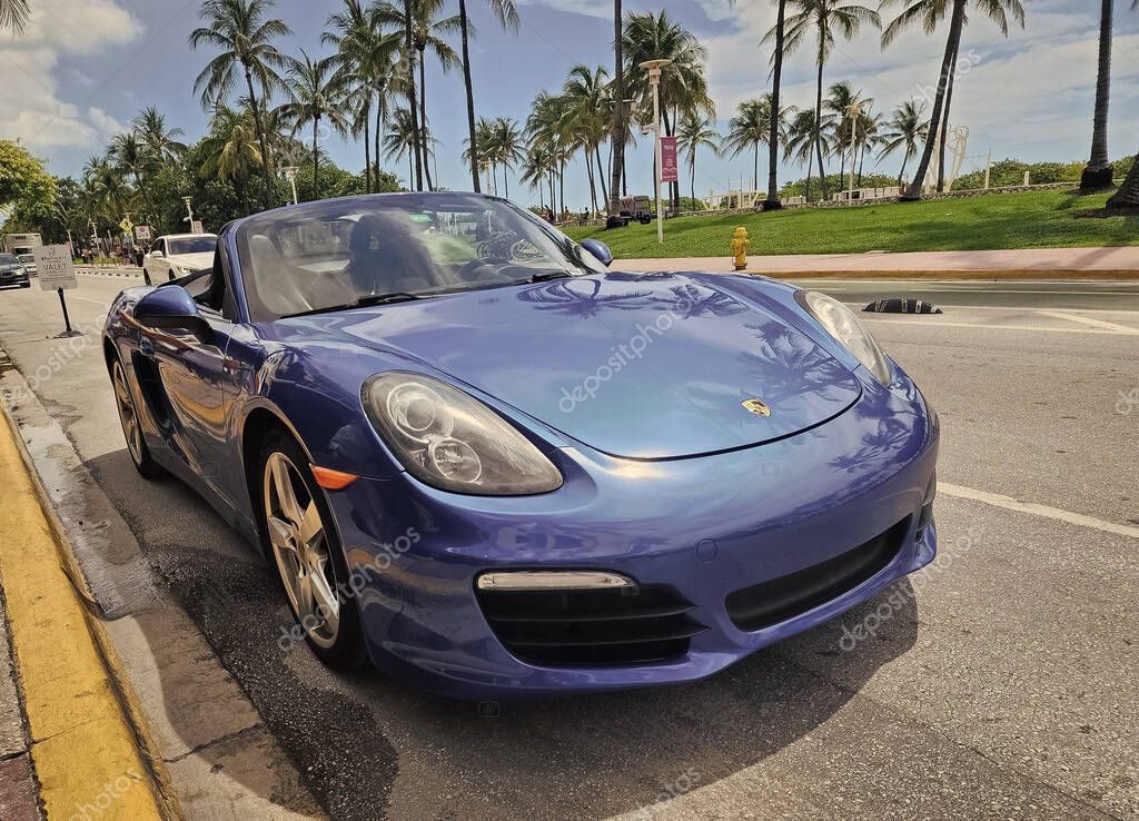 Miami Beach, Florida USA - June 89, 2024: 2018 Porsche 718 Boxter blue color at miami beach. luxury car porshche at ocean drive Miami beach.