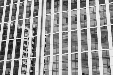 Bina arka planı. Cam bina. Mimari detay. Mimarinin arka planı. Modern cam arka plan. Cam cephe. Minimalist arka plan tasarımı. Mimarlık. Ön cephe mimarisi inşa ediliyor.