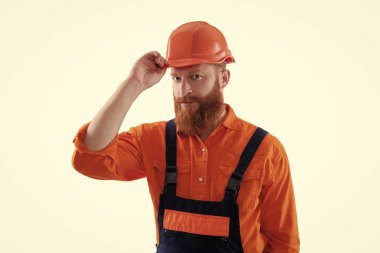 Denetmen ya da işçi. Sakallı adam inşaat işçisi. İşçi beyazı izole etti. İnşaat mühendisi. İnşaat işgali. İnşaat mühendisi. İşçi Bayramı.